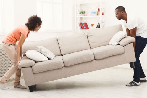Couple moving sofa | California Renovation